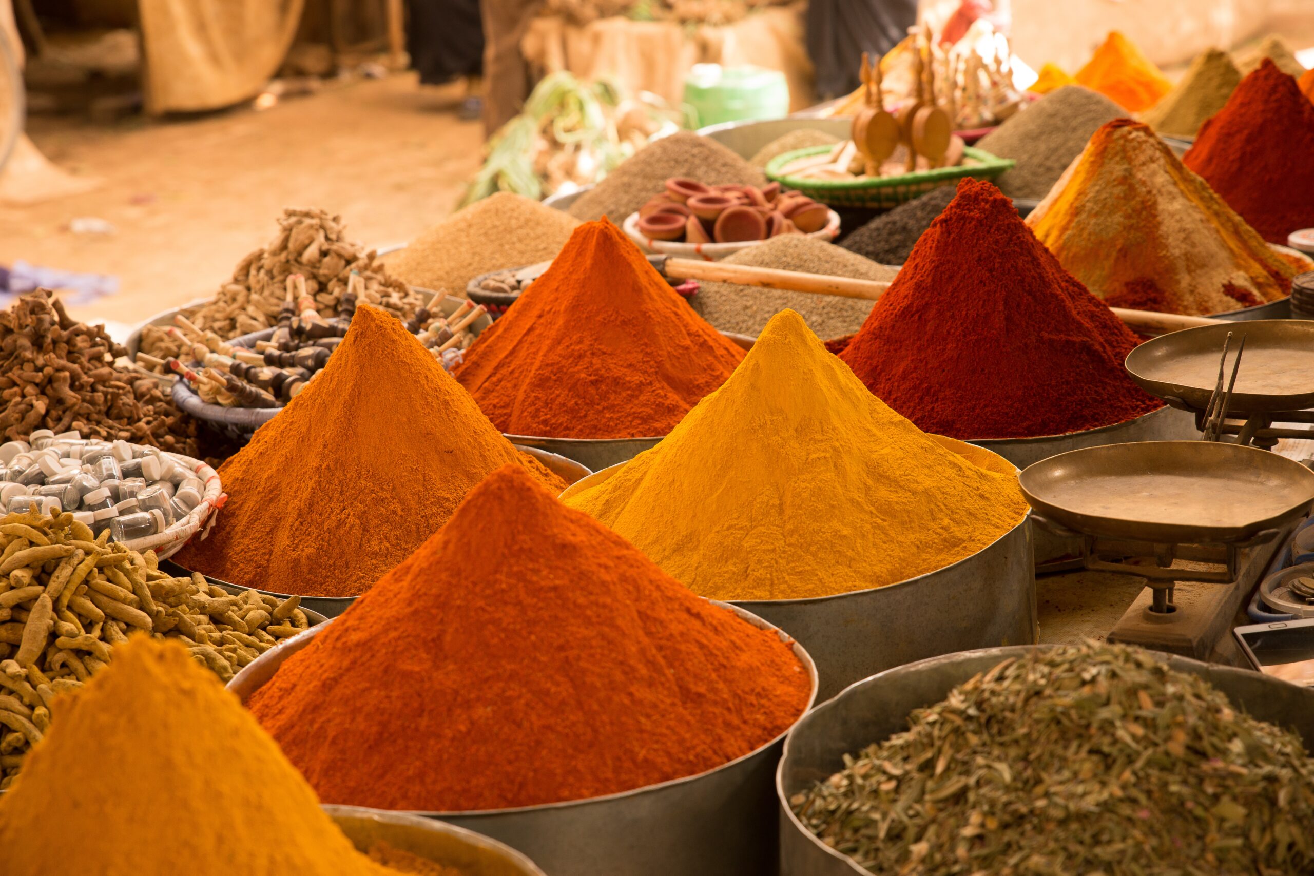 closeup shot of colorful asian spices in the market with a blurry background